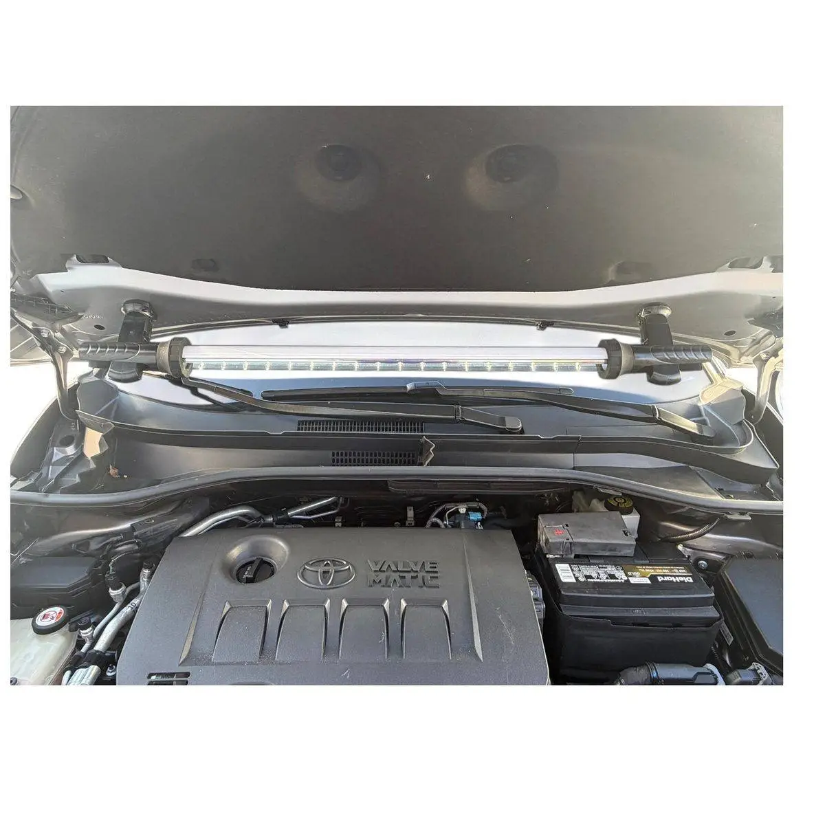 Under Hood LED Work Light, Rechargeable, 1200 Lumens 2 Rechargeable under hood LED work light installed under an open car hood